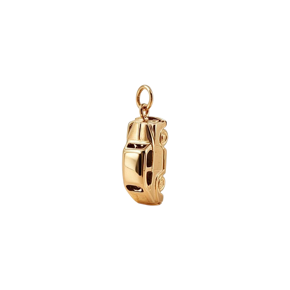 Angled view of 14k gold vintage VW Beetle car charm showing its three-dimensional polished body