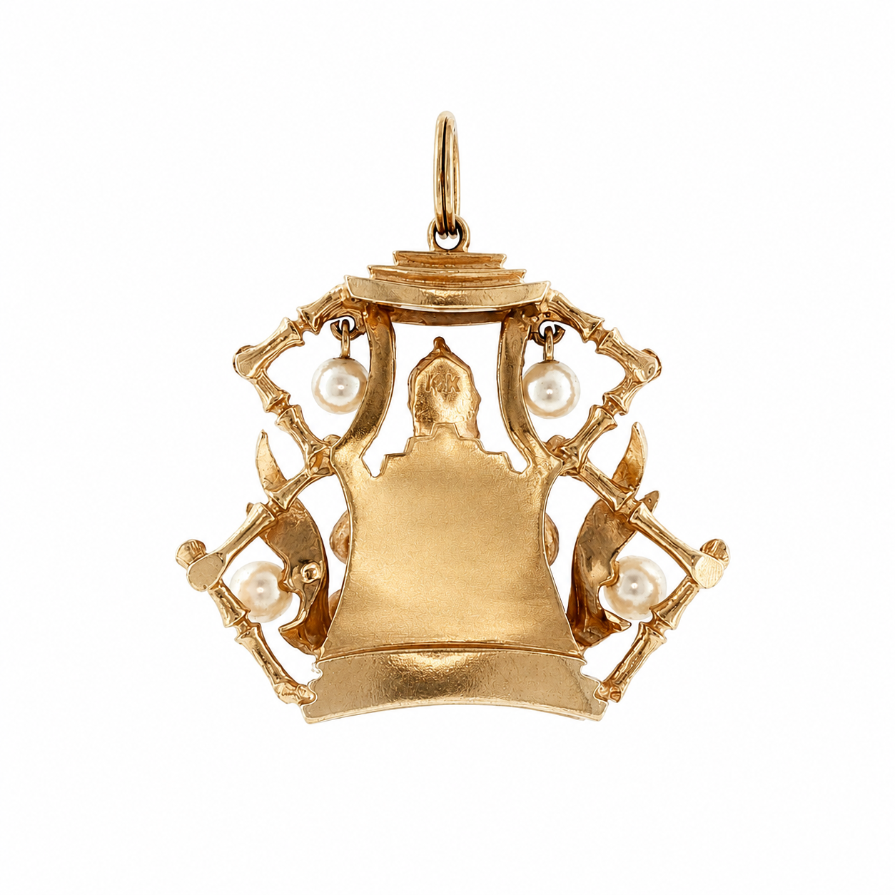 Back view of vintage gold Buddha meditation charm showing pagoda frame and pearls