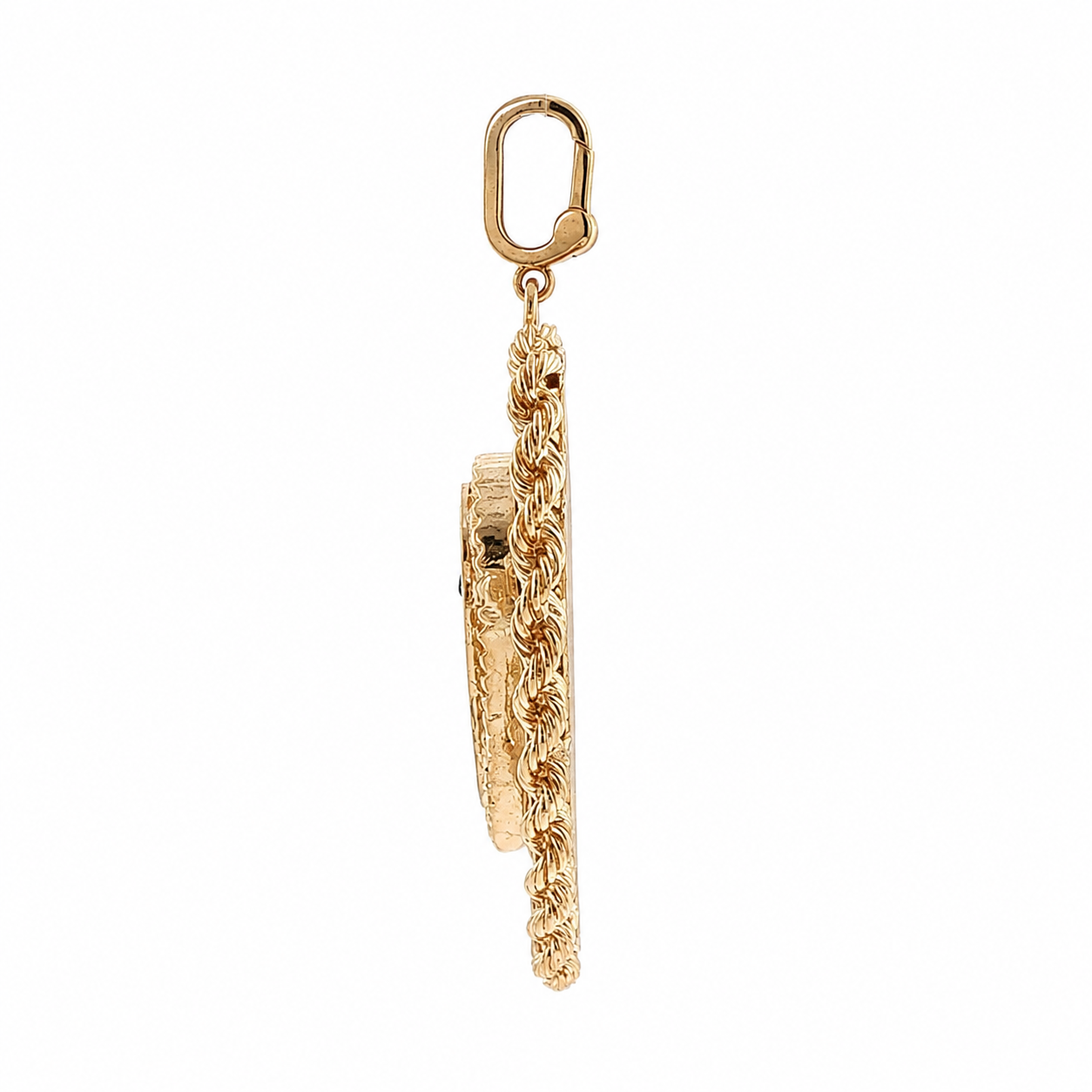 Side view of vintage gold heart locket pendant showing thick profile, rope-twist edge, and clip-style bail