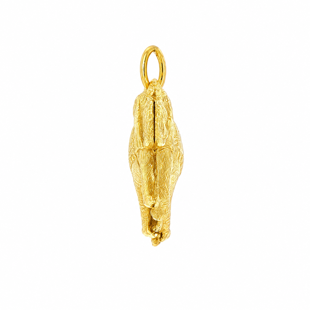 Two-sided 1970s 18k yellow gold elephant charm with textured engraving
