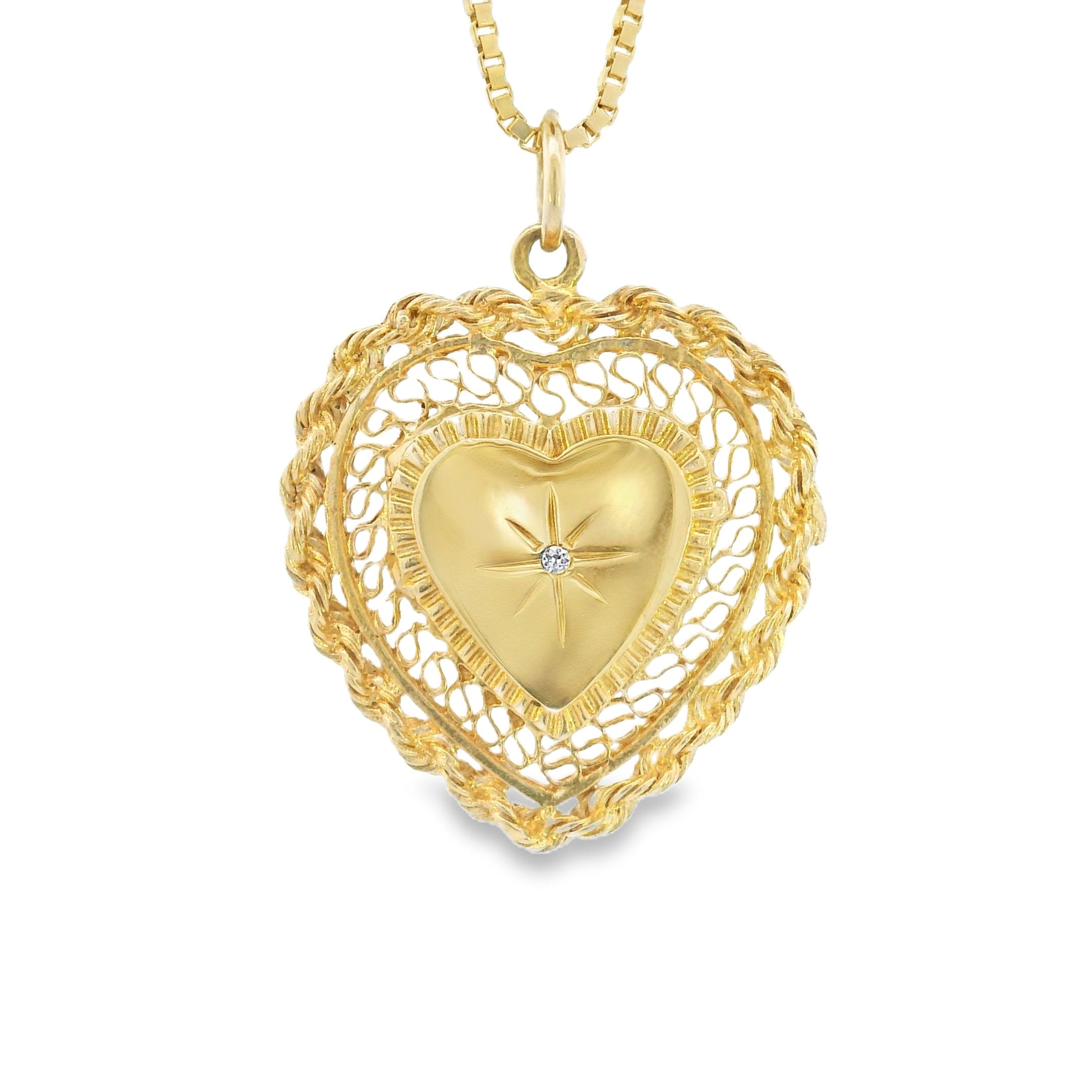 Relicario vintage en forma de corazón con diamantes en oro amarillo de 14 k