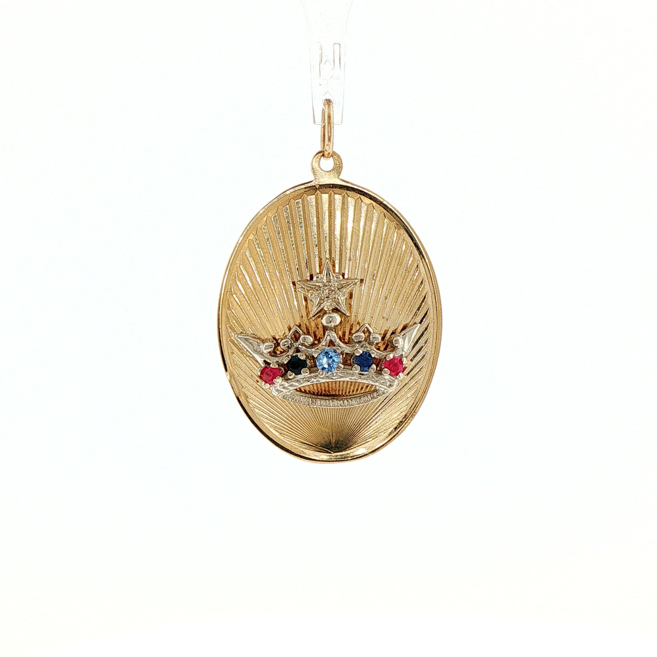 1960s 14 karat yellow gold engine-turned crown charm pendant with gemstone accents, front view