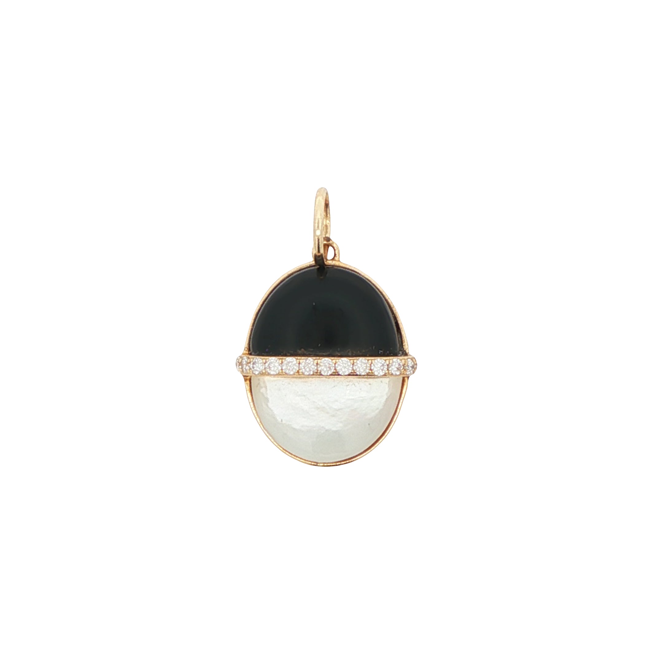 Gold pendant with black and white stones on a white background
