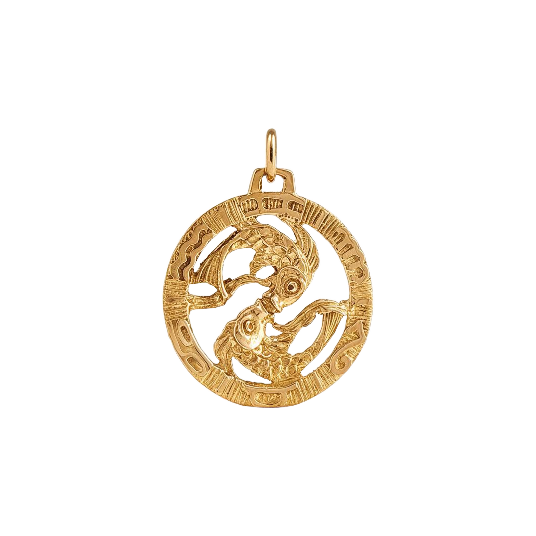 Back of 14k yellow gold Pisces charm, sculpted two-sided fish in an openwork disc