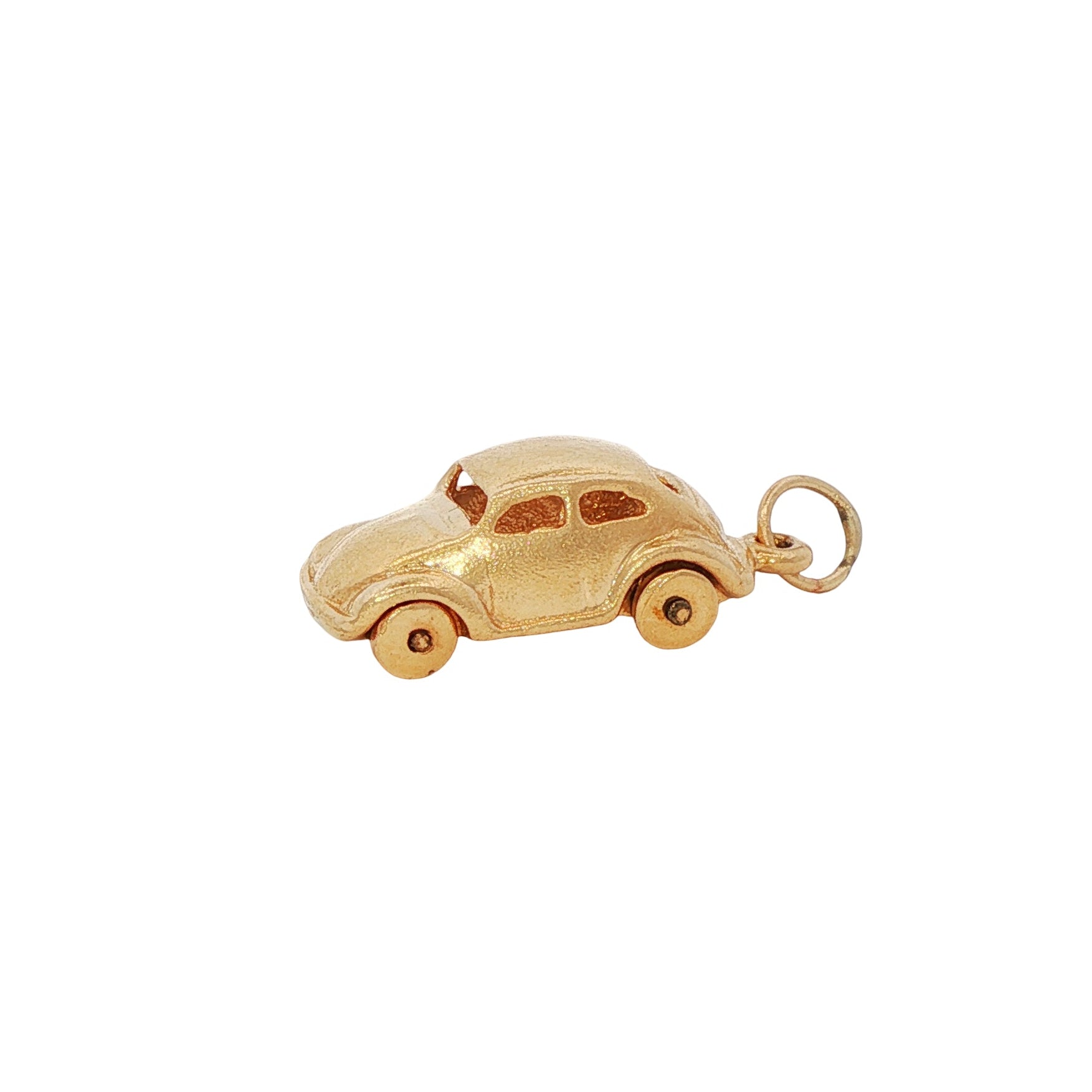 vintage  mid-century  car charm 14k gold with wheels white background