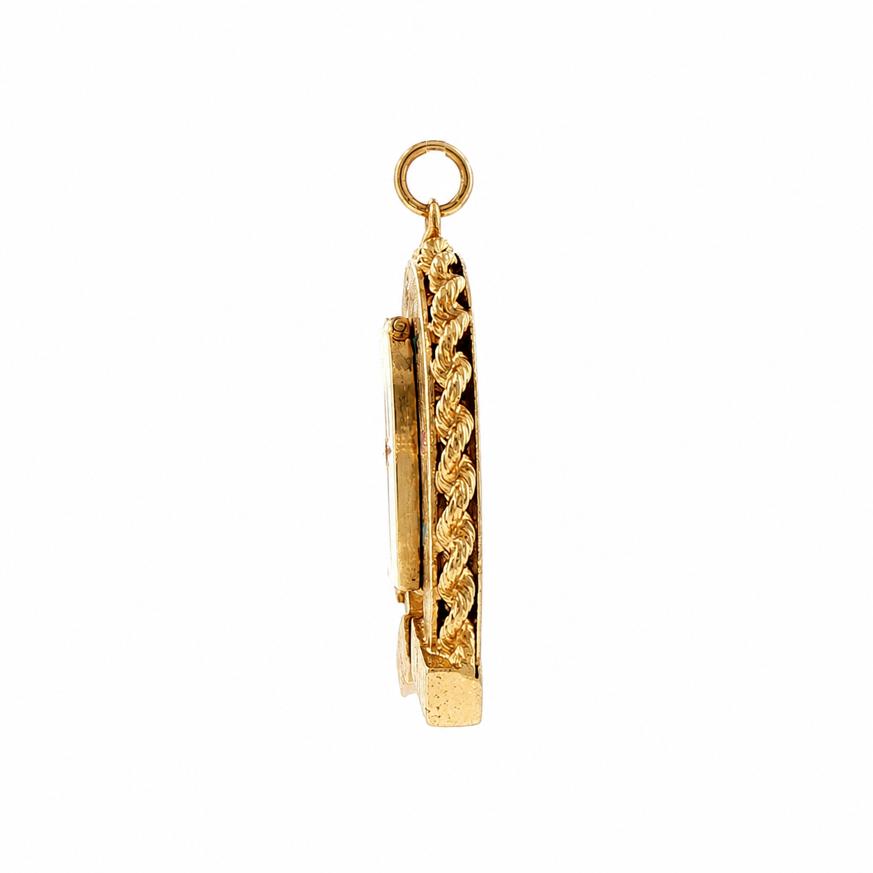 Side view of vintage gold horseshoe locket showing rope-twist edging and hinged front panel