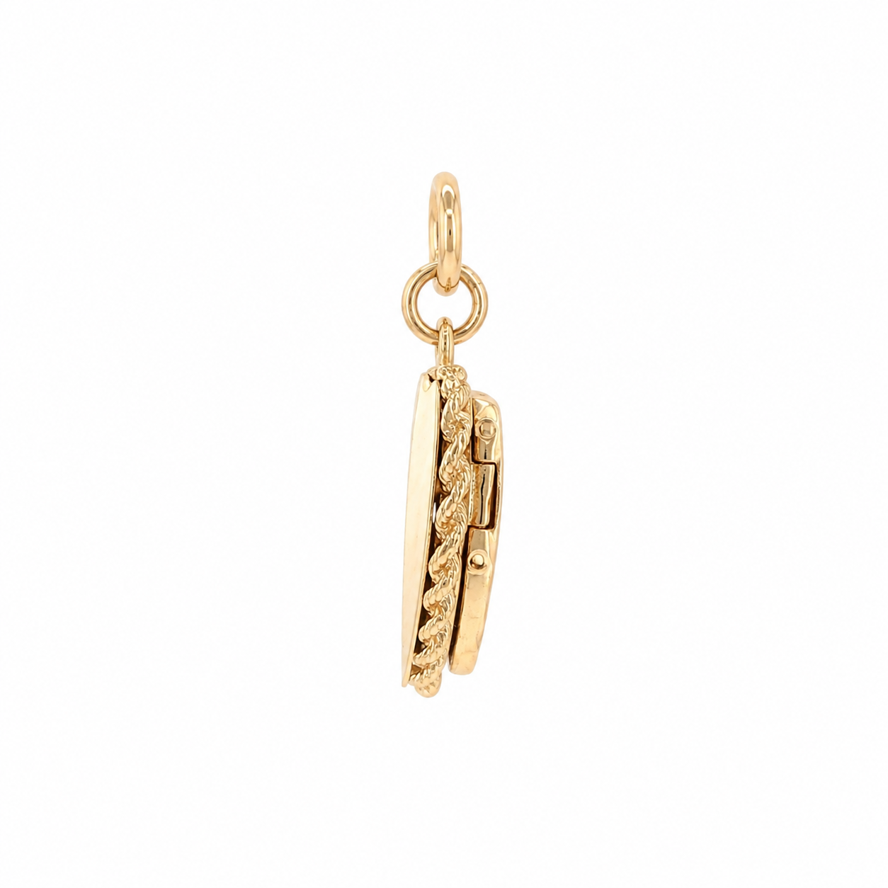 Hinge-side profile of vintage gold heart locket, rope edge and round bail visible