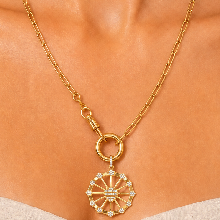 14k yellow Gold necklace with a pendant on a model against a neutral background
