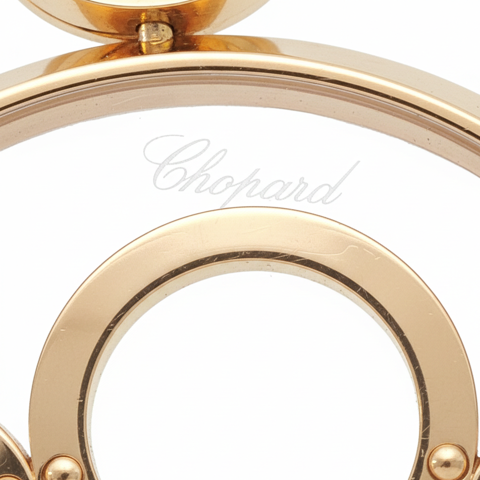 Vintage Chopard "Happy Spirit" 18k Gold Circle Charm with Diamond Accent