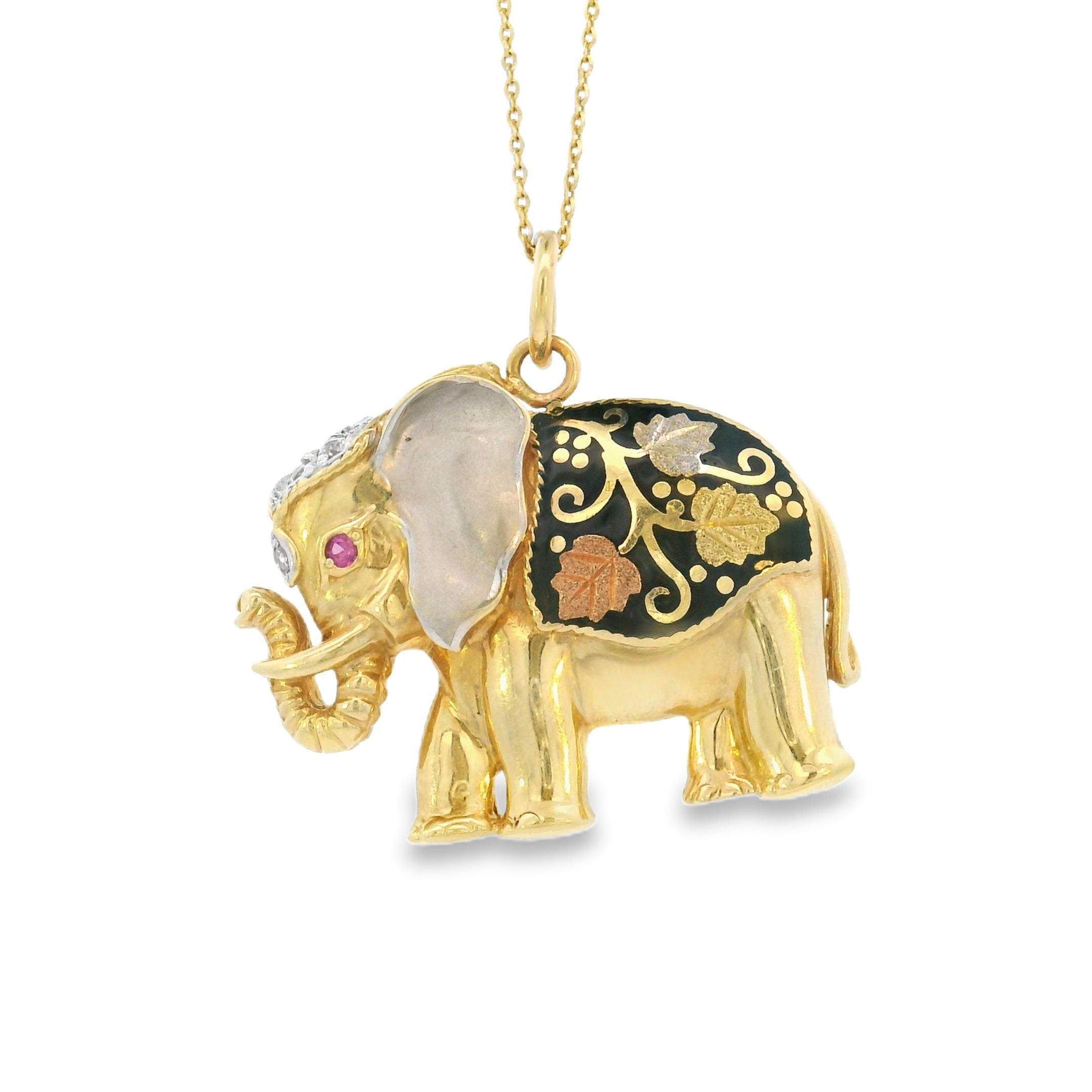 Encanto de oro de 14k con elefante de piedras preciosas vintage