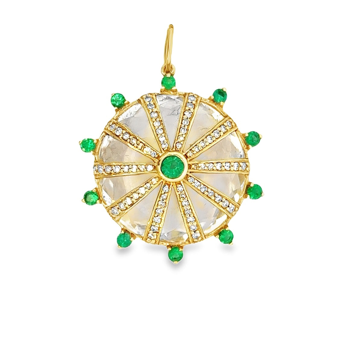 Gold pendant with green gemstones on a white background