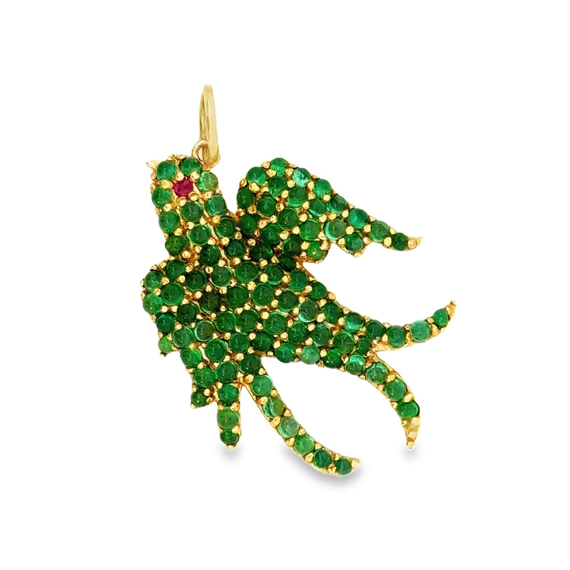 Gold and green gemstone pendant on a white background