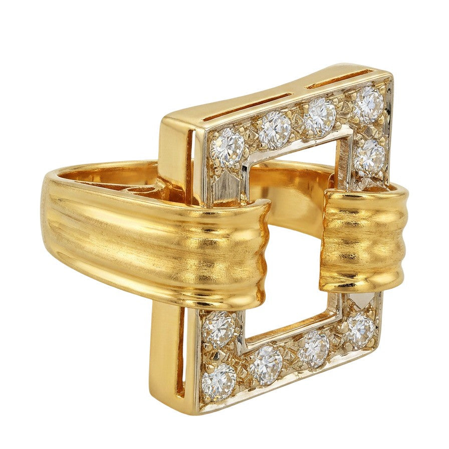 1980s 18 karat yellow gold Modernist diamond ring with a rectangular openwork top and pavé diamond sections, shown in a straight front view