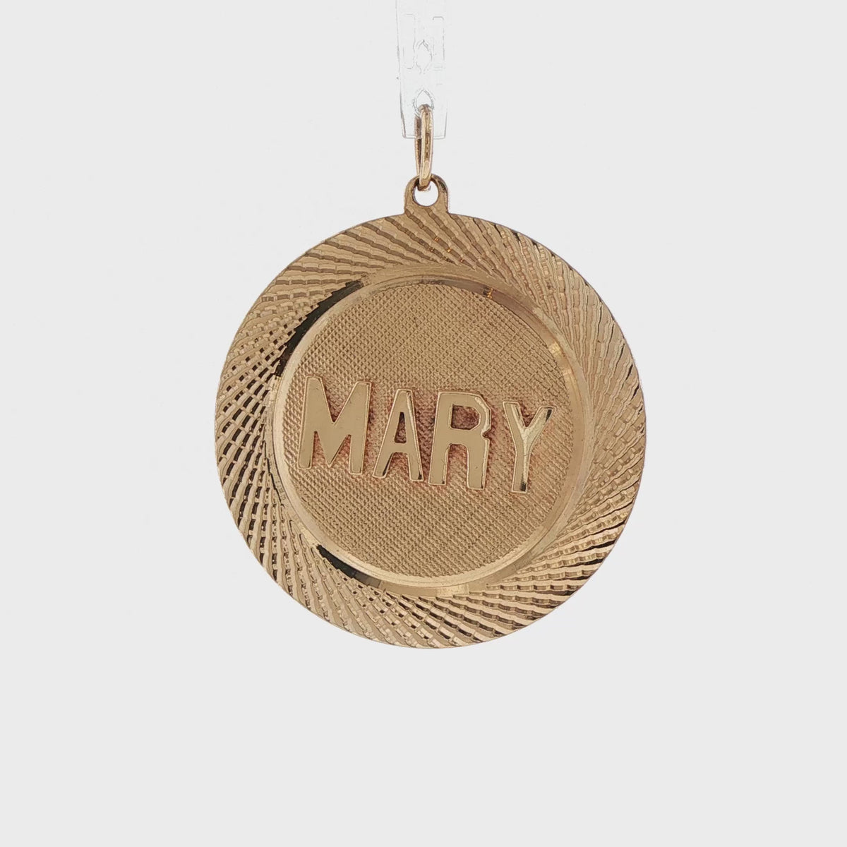 Video of a 14k yellow gold vintage Mary name medallion charm
