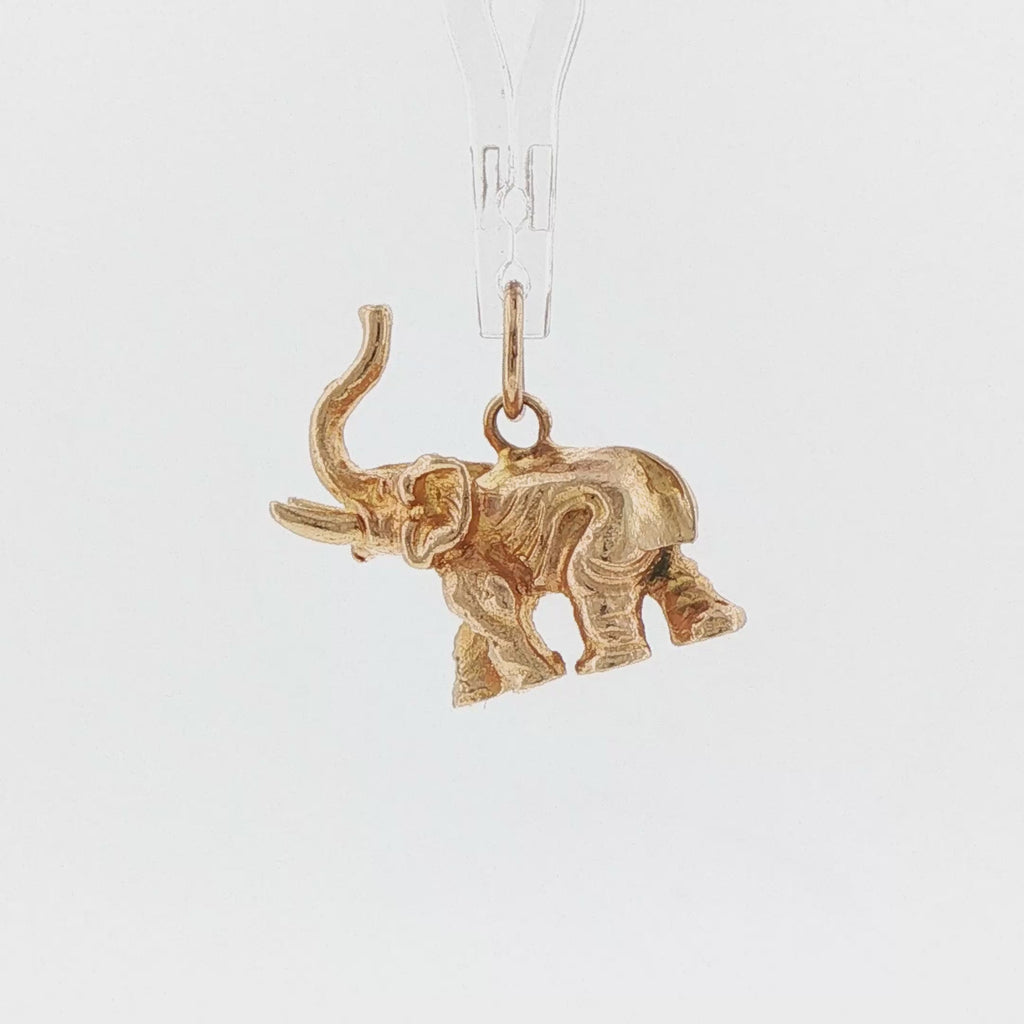 Video of a 14k yellow gold vintage good luck elephant charm