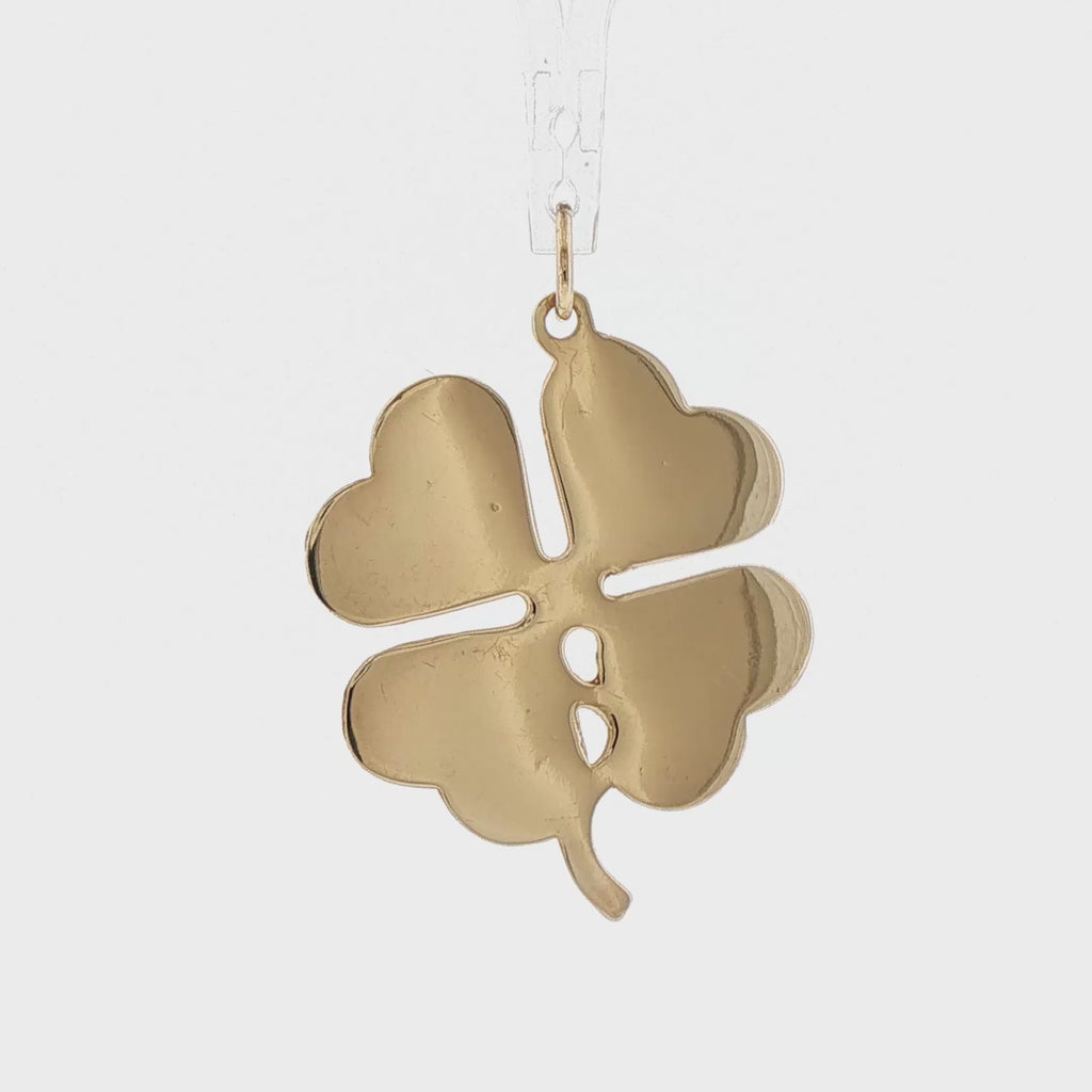 Video of a 14k yellow gold 1960s vintage four leaf clover charm