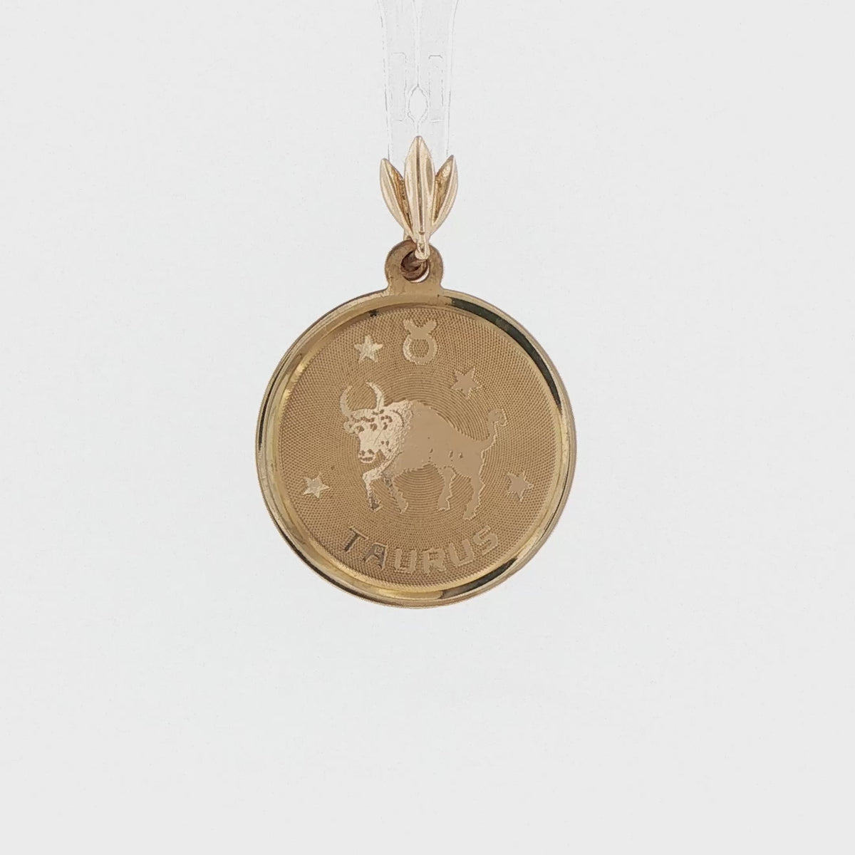 Video of a 14k yellow gold vintage 1970s Taurus zodiac charm