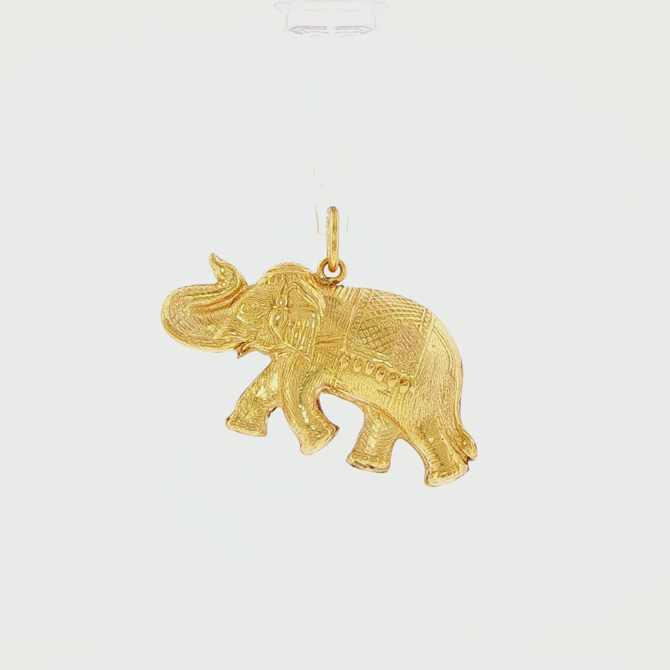 Video of 1970s 18k yellow gold elephant charm with raised trunk