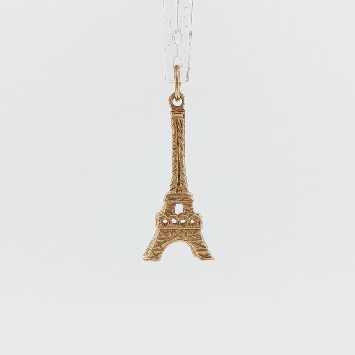 Video of a 14k yellow gold 1960s vintage Eiffel Tower charm