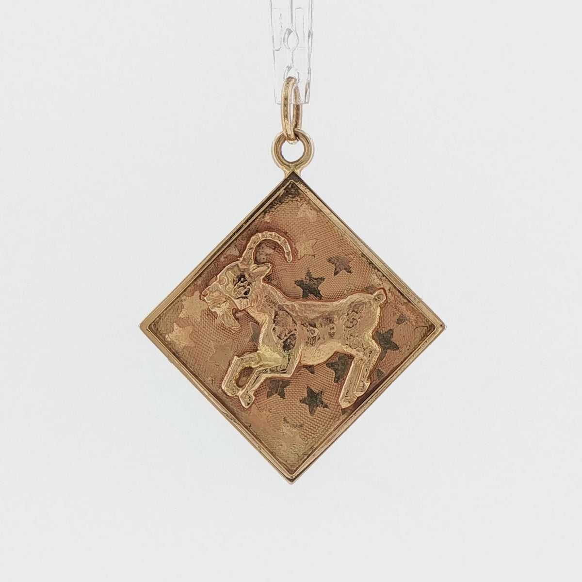 Video of a 14k yellow gold vintage Aries ram zodiac charm
