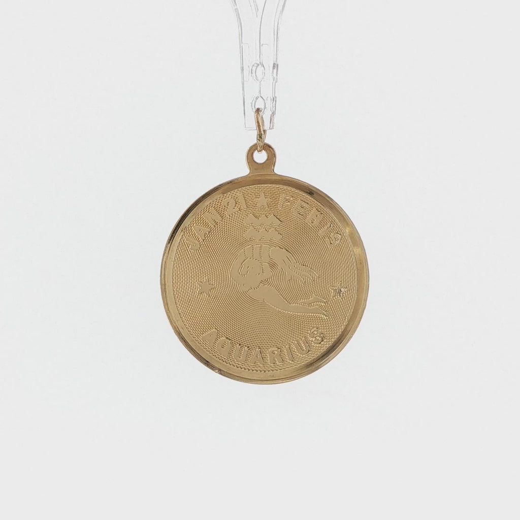 Video of a 14k yellow gold vintage Aquarius zodiac disc charm