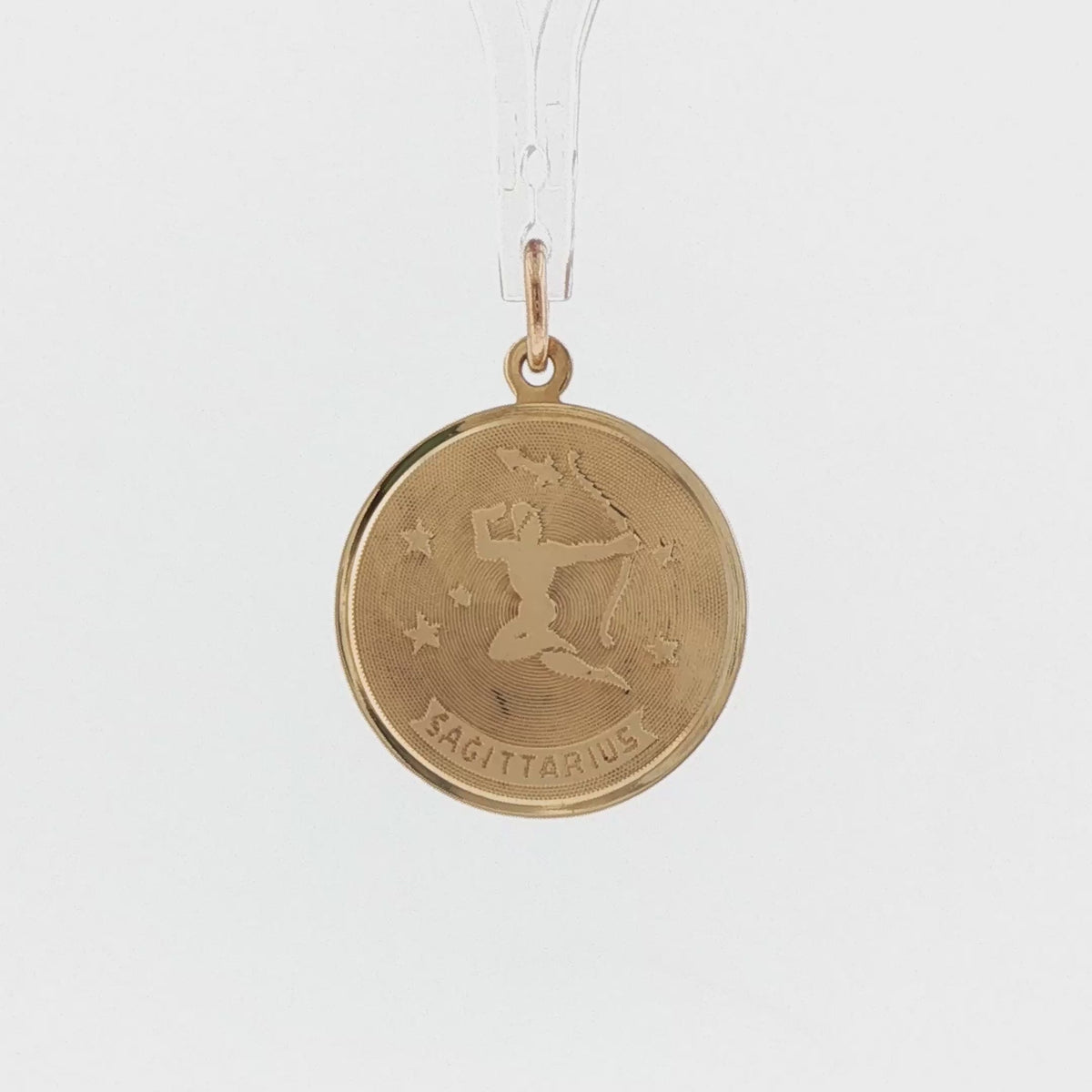 Video of a 14k yellow gold vintage Sagittarius archer zodiac charm