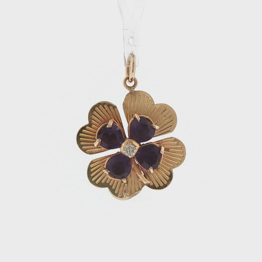 Video of a 14k yellow gold amethyst and diamond clover charm